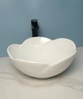 Bathroom Sink Ceramic Vessel Sink Bathroom Creative Petal Ceramic Counter Basin modern white design with sleek curves.