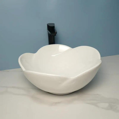 Bathroom Sink Ceramic Vessel Sink Bathroom Creative Petal Ceramic Counter Basin modern white design with sleek curves.