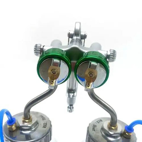 Heavy Duty Double Nozzle Pneumatic Spray Gun With Pressure Feed showing dual green nozzles and stainless frame, ideal for precision projects.