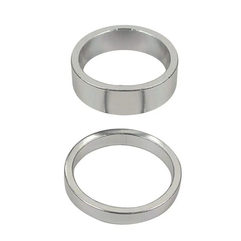 Two silver anodized spacers from Ten Pack Bike Headset Spacers For One And One Eighth Inch Steerer Aluminum Alloy Stem Spacers With 5mm And 10mm Heights Silver Finish Dope Anodized Spacers For Precise Headset Height Adjustment Great For Road And Mountain Bikes