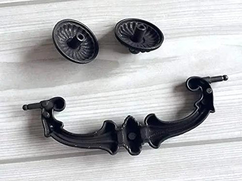 Top Shelf Vintage Style Bail Drawer Pull In Antique Brass With Gold Accent For Kitchen Cabinets And Dressers Built Like A Tank Rock Solid Zinc Alloy Weekend Home Upgrade Ready To Install on wooden surface.