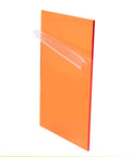 Top Shelf Laser Safety Window Plate For 200 To 540 Nm With Heavy Duty Blue Light Filtering And Smooth Industrial Grade OD 7 Plus Eye Protection Cover Clear Transparent Filter displayed at an angle with orange tint.