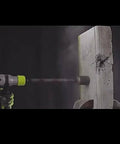 Action shot of a 1500 Watt Heavy Duty Rotary Hammer Drill With Four Operating Modes Featuring Smart Vibration Control and Safety Clutch, drilling concrete.