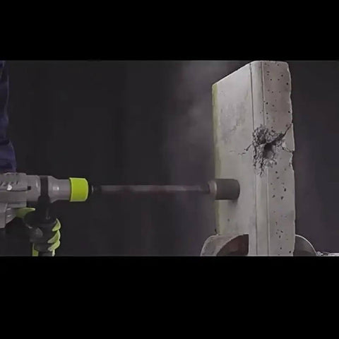 Action shot of a 1500 Watt Heavy Duty Rotary Hammer Drill With Four Operating Modes Featuring Smart Vibration Control and Safety Clutch, drilling concrete.
