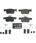 PowerStop Z23-2102 carbon-fiber ceramic rear brake pad kit with installation hardware, front view