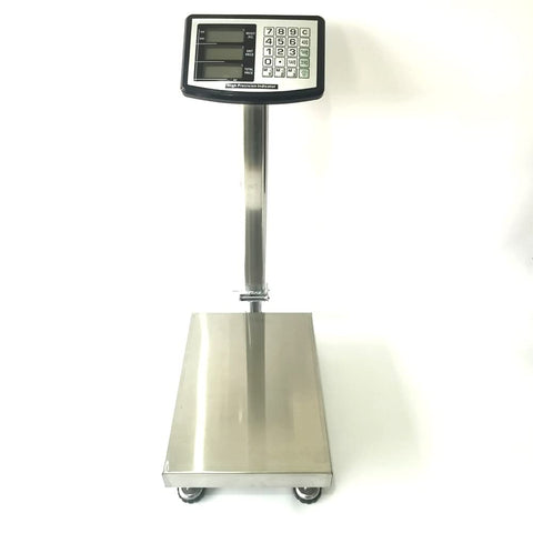 Rock Solid Heavy Duty Platform Scale Built Tough For Warehouse Shipping And Commercial Jobs with large LCD screen and stainless base.