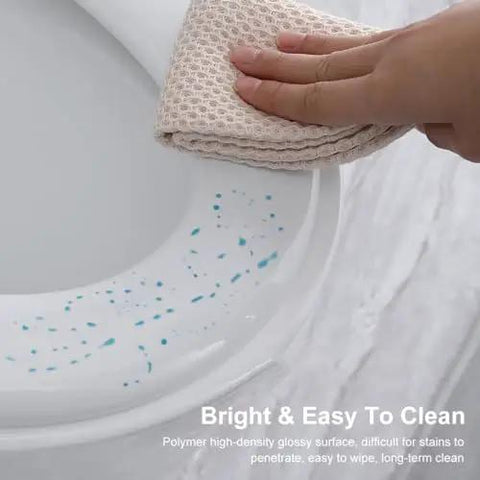 Solid Build Soft Close Elongated White Toilet Seat With Quick Release Hinges For No Sweat Installation Scratch Resistant Cover Built For Easy Cleanup And Chill Bathroom Routine being wiped clean.