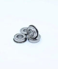 Grab These Badass 10-Piece Stainless Steel Deep Groove Ball Bearings Size 7x11x3mm, showing three bearings with flanged design.