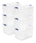 Six Pack Of 66 Quart Clear Plastic Storage Containers With Sleek Blue Latching Lids Designed For Heavy Duty Stackable Organization And Hassle Free Clutter Control In Your Living Room Or Home Office - stacked set of clear bins with blue lids.