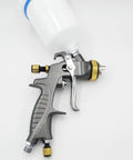 Heavy Duty Eco Friendly Pneumatic Spray Gun With Top Loading Cup shows nozzle and handle, designed for automotive painting.