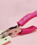 No Fuss Easy Grip One Quarter Inch Hole Punch With Scraps Tray Round Circle Punch for crafts and binders, pink handheld design.