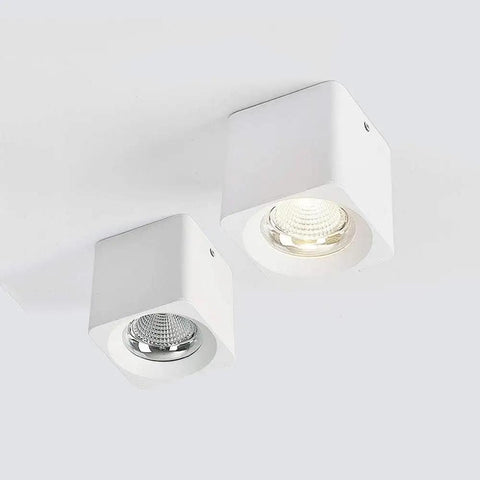 iumLeap Recessed Lighting Housing Trim Kits White COB Ceiling Spotlight Fixture Downlight Bright Square Aluminum Panel Lamp Indoor Panel Light for Hallway Display, Warm Light(3000k)_30w, two square white fixtures mounting on ceiling.