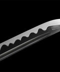 Close-up of 40 Inch Japanese Iaito For Training With Dull Blade Handmade Full Tang Practice Sword tip detail in black background