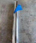 Four By Two Hundred Fifty Foot Synthetic Roof Underlayment Pro Grade Heavy Slick Roll showing blue peel-off film on a silver roll.