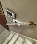Straight Up Solid Acrylic Railing Kit With Heavy Iron Brackets For Modern Stair Safety And Deck Rails Featuring Quick Setup Installation And Knockout Wear Resistant Finish For 17 Foot Runs That Bring Top Tier Protection To Your Home Projects on a staircase wall.