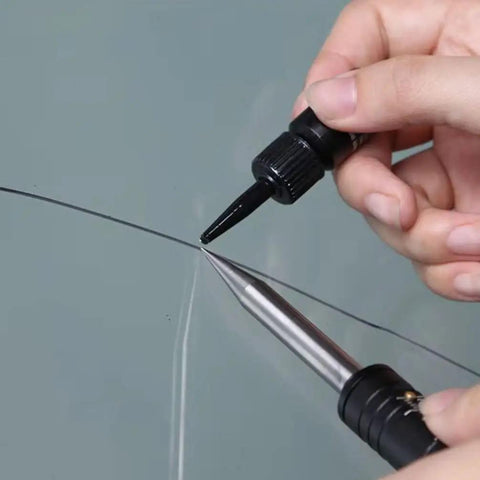 Applying resin with a tool to a cracked windshield using Windshield Repair Kit For Chips And Cracks Easy Application Glass Crack Repair Tool For Automotive Use Quick And Safe Fix For Car Windows With Professional Grade Resin And Clear Long Lasting Bond