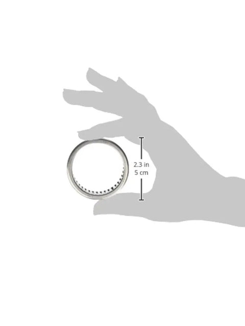 Hand holding a 2.3 in NRB Drawn Cup Full Complement Needle Roller Bearing B2816 Series, showing size and design.
