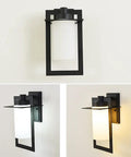 Top Tier Modern Outdoor Wall Sconce Featuring Waterproof Black Matte Aluminum Bracket And Cylindrical Glass Shade mounted on a wall.