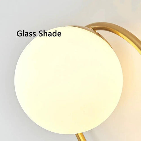 Close-up of Modern Luxury Sphel Glass lampshade Wall Sconce 9.0 Inch Width den Iron Body Wall Lamp with 3 Color Mode Indoor Lighting Fixture.