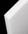 Close-up of edge of a sheet from 4 Pack 10 By 10 Inch UHMW Polyethylene Sheets One Quarter Inch Thick Opaque White Plastic For Home Shop Auto Use