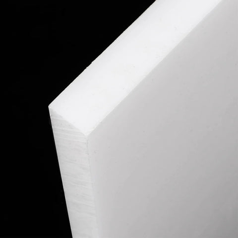 Close-up of edge of a sheet from 4 Pack 10 By 10 Inch UHMW Polyethylene Sheets One Quarter Inch Thick Opaque White Plastic For Home Shop Auto Use
