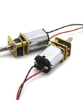 Heavy Duty N20 Dc Reduction Gear Motor Delivers 210 Or 400 Rpm, featuring metal casing and wired connections, ideal for RC car builds.