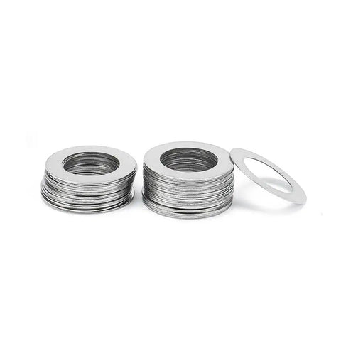 Five Hundred Count 304 Stainless Steel Ultra Thin Shim Washers Half Millimeter Precision Gasket Hardware stacked in piles.