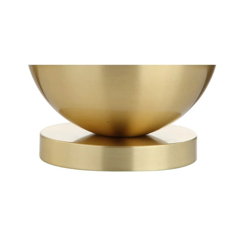 Detail of brass base for White And Brass Gold Ceramic Table Lamp With White Linen Drum Shade, part of modern glam design in bedroom or living room