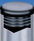 Close-up of Pack Of Four Two And A Quarter Inch Round Plugs Black Plastic End Caps, fitting metal tube ends for furniture and equipment.