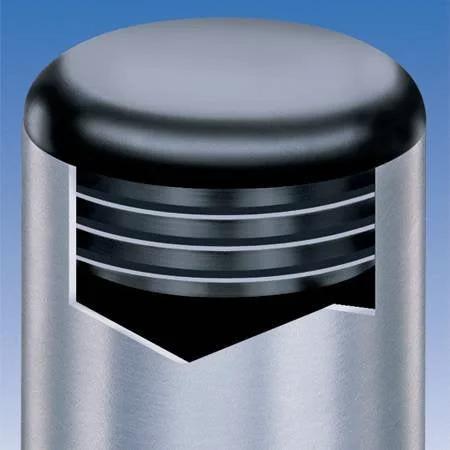 Close-up of Pack Of Four Two And A Quarter Inch Round Plugs Black Plastic End Caps, fitting metal tube ends for furniture and equipment.