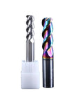 Two round-nose milling cutters: silver carbide end mill and rainbow-coated carbide end mill with white plastic holder