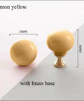 Totally Fresh Ceramic Ball Cabinet Knob Lemon Yellow Single Hole Drawer Pull For Bedroom Dresser And Kitchen Cupboard Lowkey Perfect Hardware Upgrade That Hits Different, 33mm wide, 46mm high with brass base.