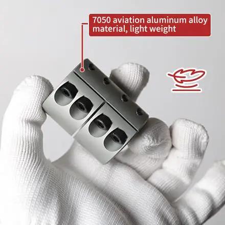 12mm To 18mm Aluminum Shaft Coupling Rock Solid Clamping Shaft Coupler shown in gloved hand with 7050 aluminum material label