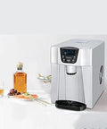 Portable Countertop Ice Maker with Water Dispenser Silver Automatic Unit Generates 33lbs Fast Ice 24 Hrs on a countertop with drinks.