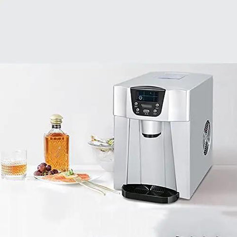 Portable Countertop Ice Maker with Water Dispenser Silver Automatic Unit Generates 33lbs Fast Ice 24 Hrs on a countertop with drinks.