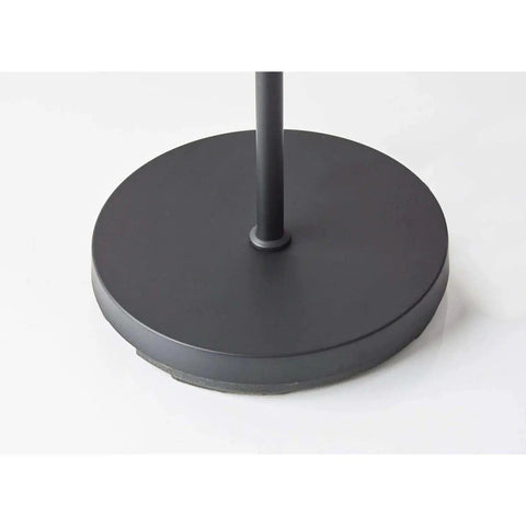 Close-up of the black metal base of the Hugo Table Lantern With Natural Bamboo Shade And Black Metal Finish, Cozy Glow And Chill Vibe, Easy Rocker Switch, Tall Narrow Design For Modern Living Rooms Or Bedrooms, Complements Hugo Floor Lamp And Pendant Lighting.