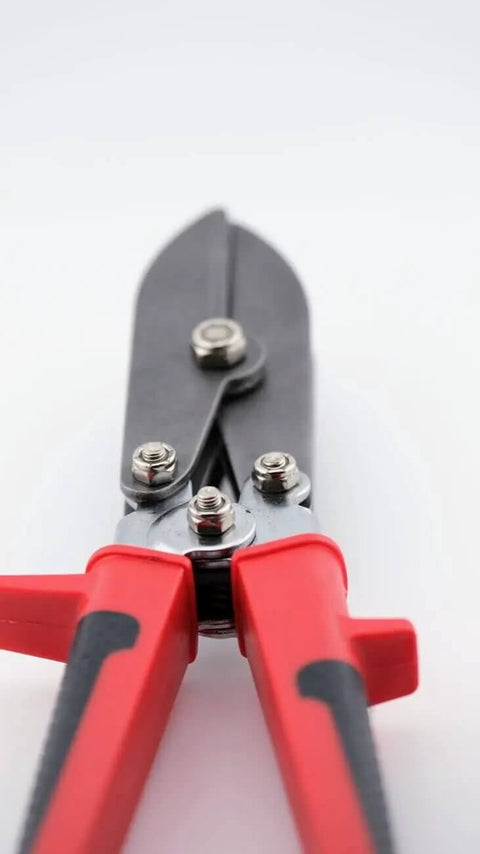 Close-up of 16-142 5-Blade Sheet Metal Crimper for HVAC installations with ergonomic RedLine handles, showing metal blades.
