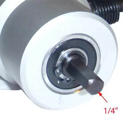 Close-up of Dope Speed Drill Attachment Nibbler showing 1/4 inch shaft, fits electric drills, cuts metal, rotates 360 degrees for smooth edges.