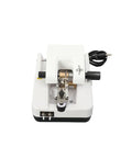 Tough As Nails Automatic Optical Lens Groover And Beveling Machine For Eyeglasses, compact design with controls and power cord.