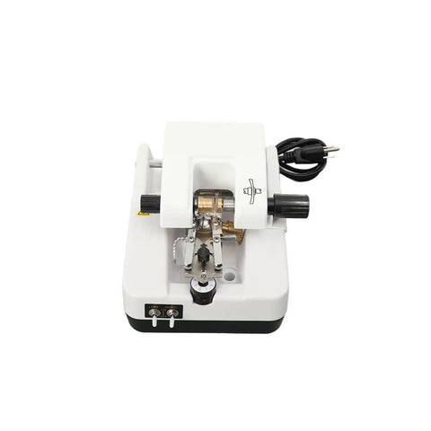Tough As Nails Automatic Optical Lens Groover And Beveling Machine For Eyeglasses, compact design with controls and power cord.