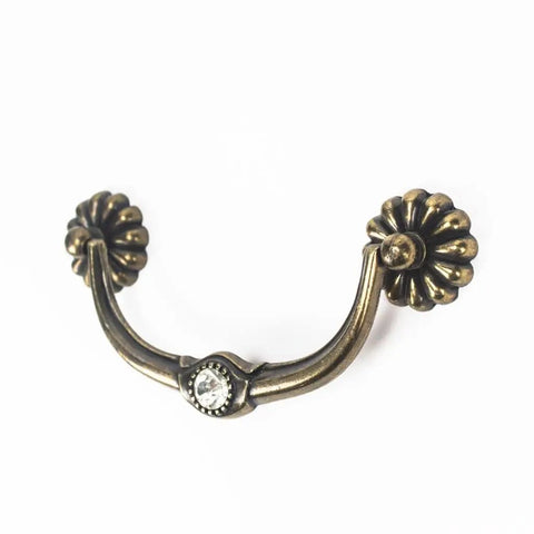 Antique style zinc alloy pull handle with floral ends, solid build, European vintage style hardware for cabinets and drawers.