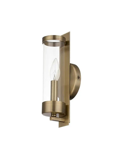 Castleton Antique Brass 1 Light ADA Wall Sconce With Clear Glass Cylinder, side view showing antique brass finish and bulb
