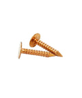 Heavy Duty 3/4 Inch Solid Copper Ring Shank Roofing Nails With 3/8 Inch Head displayed close-up for roof and gutter installation.
