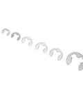 Various sizes of stainless steel E clips from Heavy Duty 300 Piece Stainless Steel E Clip Set M1.2 To M15 Retaining Ring Circlip Assortment Kit displayed.