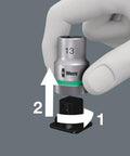 Hand using Easy Twist Unlock on Zyklop One Quarter Inch Socket Belt Set With Holding Function On A Tough Textile Belt 10 Piece Metric Socket Kit