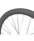 Close-up of Beefy 50mm Carbon Fiber Road Wheelset With Center Lock Disc Brakes, 24 hole design, showing rim and spokes.