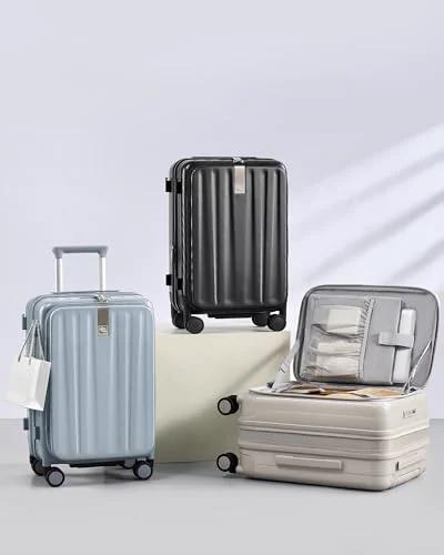 Hanke 24-inch expandable hard-shell luggage set with wheels; ivory white, light blue, and black; one case opened.