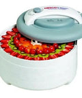 Four Stackable Tray Food Dehydrator And Jerky Maker For Homemade Healthy Snacks Smooth Operation Top Grade Kitchen Essential To Crush Your Snack Game And Keep Things Fresh Always with stacked fruits.