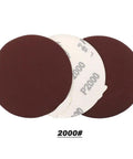 Six Inch Wet Dry Sanding Discs With Hook And Loop Backing Include 5 Different Grits Like 1000 And 2000 Plus 3000,4000,And 5000 For Professional Car Polishing And Grinder Use On A Big Deal, showing P2000 grit.