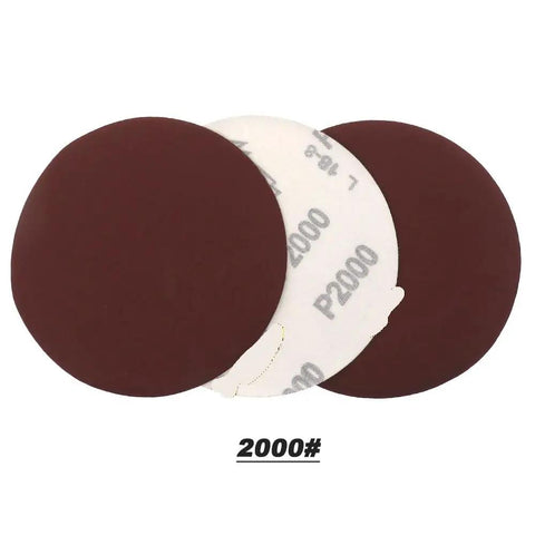 Six Inch Wet Dry Sanding Discs With Hook And Loop Backing Include 5 Different Grits Like 1000 And 2000 Plus 3000,4000,And 5000 For Professional Car Polishing And Grinder Use On A Big Deal, showing P2000 grit.